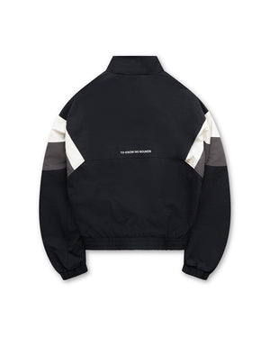 Black jacket with color-blocked sleeves on a white background